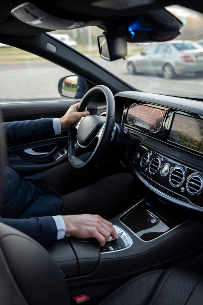 Elegant driver in a taxi