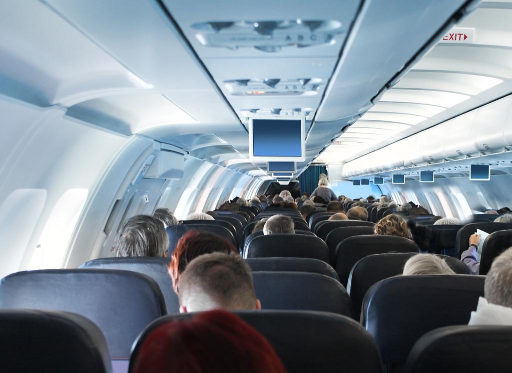  Passenger in plane cabin